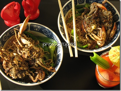 preeoccupied-pepper-crabs-on-a-bed-of-wok-fried-garlic-noodles